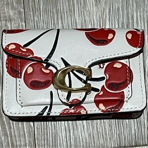 Coach Mini Tabby Bag Charm
With Cherry Print